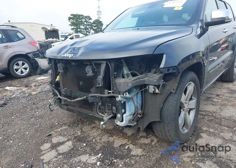 2014 Jeep Grand Cherokee Overland z USA, uszkodzony, nr VIN 1C4RJECGXEC198862